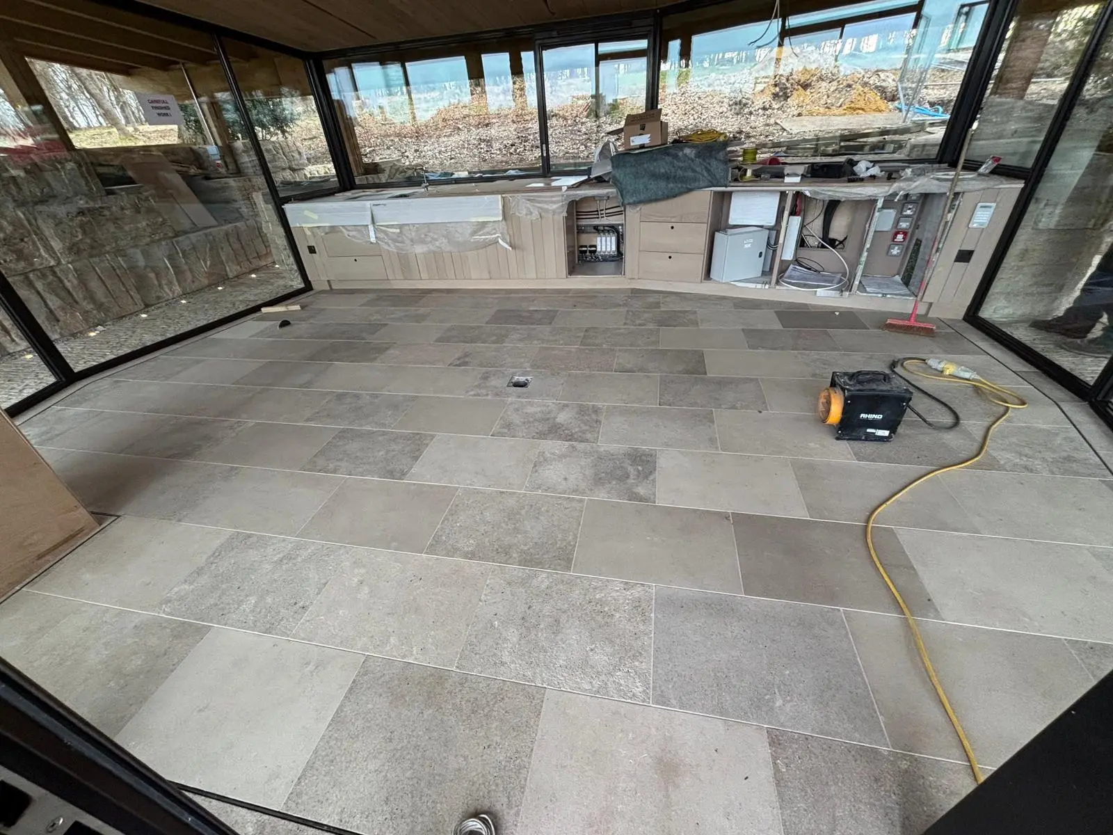 Poolside area with high-end artificial turf and paving