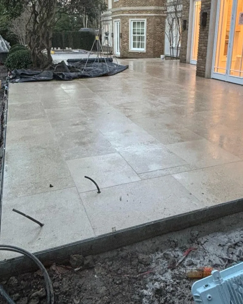 Poolside area with high-end artificial turf and paving